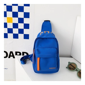 Detail of blue canvas kids chest bag with orange zipper and fashion logo print