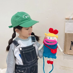 Handmade crochet cartoon character crossbody bag for kids with colorful knit texture