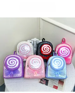 Group display of colorful sequin mini backpacks for girls with lollipop design