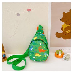 Detail of green nylon kids dinosaur chest bag with adjustable strap and cartoon print