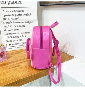 Side view of pink sequin kids backpack with PU leather straps and metal zipper detail