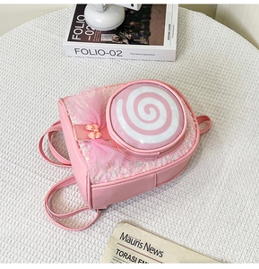 Pink sequin lollipop backpack for girls with mesh bow detail on a white grid background