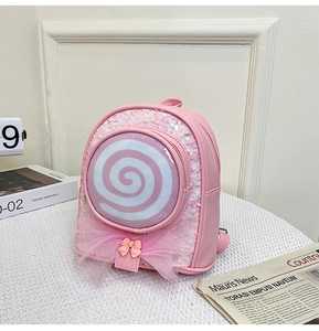 Detail of pink toddler backpack with sequin lollipop design and tulle bow decoration