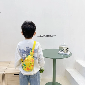 Cute yellow canvas kids crossbody bag with colorful cartoon dinosaur prints for travel