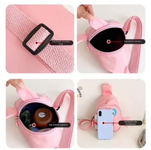 Detail view of pink shark sling bag showing adjustable strap and inner storage capacity