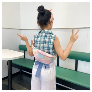 Close-up of kids colorful tie-dye waist bag with adjustable strap and pebble texture leather