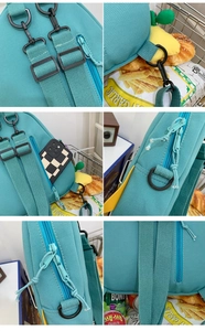 Detail view of teal canvas backpack showing adjustable straps and hidden back zipper pocket