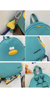 Detailed close-up of blue cartoon duck backpack with embroidery and sturdy zippers