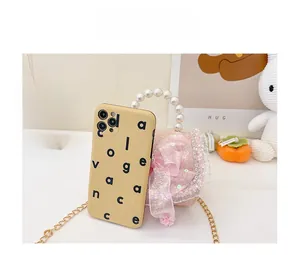 Detailed size comparison of pink lace princess bag with a bow and pearl handle