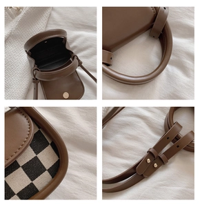Detail showing checkered fabric pattern and light gold hardware of kids crossbody bag