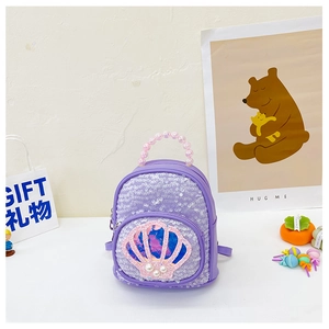 Detail of purple sequin kids backpack with gradient shell and pearl bead handle