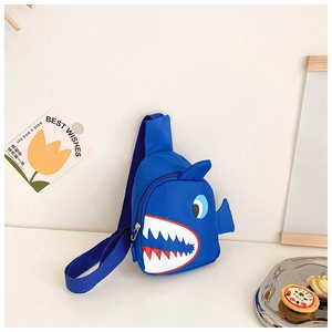Detail of blue shark cartoon chest bag for kids with durable nylon fabric and strap