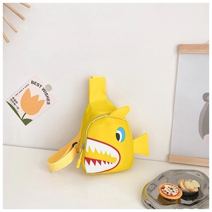 Close-up of yellow shark cartoon chest bag for kids featuring durable canvas and zipper