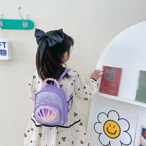 Sparkly purple sequin children's backpack with shell detail and pearl handle for girls