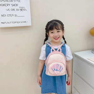 Cute pink sequin princess backpack for toddlers featuring shell and pearl decorations