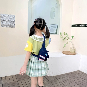 Cute shark-shaped kids canvas chest bag in navy blue with 3D fins and shark teeth print