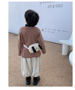 Close-up of child canvas chest bag featuring a cute puppy face and soft 3D ears