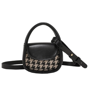 Mini crossbody bag featuring a classic houndstooth pattern and gold-tone hardware