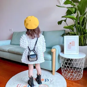 Mini black and white houndstooth crossbody bag for kids with white puff sleeve dress