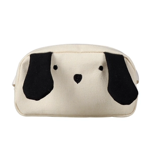 Cream canvas kids chest bag with cute black and white dog face embroidery and zipper