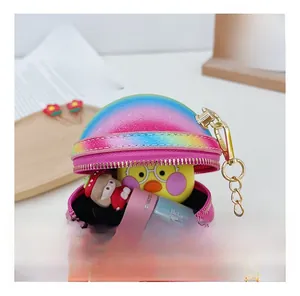 Detail view of the colorful rainbow sequin crossbody bag interior with small accessories