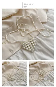 Detail view of heart-shaped white pearl woven crossbody bag for girls with strap