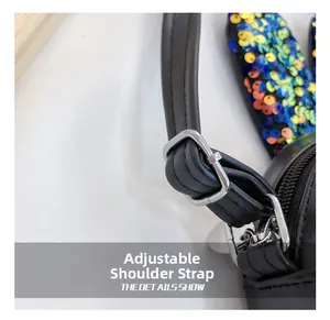 Macro shot of adjustable shoulder strap buckle and colorful sequins on girls cute bag