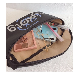 Internal view of boys' fashion chest bag showing large capacity for personal essentials