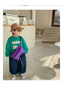 Fashionable purple canvas chest bag for boys with adjustable strap on young model