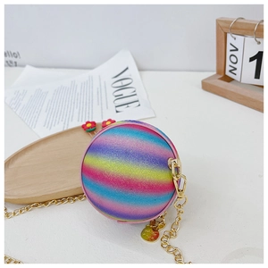 Detail of glitter rainbow spherical crossbody bag with gold chain and bunny pendant