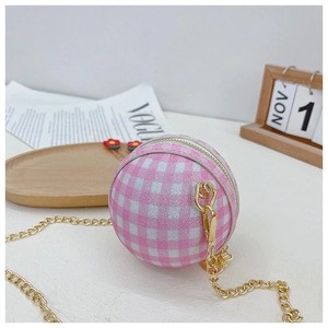 Detail of pink and white checkered ball purse for kids with gold chain and glitter finish