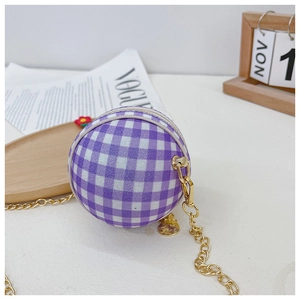 Detailed shot of a purple and white checkered spherical bag with a gold chain strap