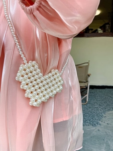 Handmade pearl heart crossbody bag for girls with elegant woven beads and thin strap