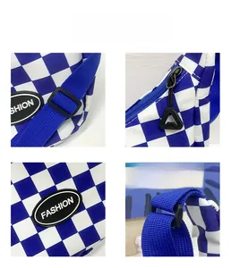 Detailed close-up showing checkerboard pattern canvas, adjustable strap, and fashion logo