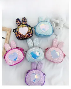 Detail view of colorful sequin rabbit bags for girls in six different shiny color variants