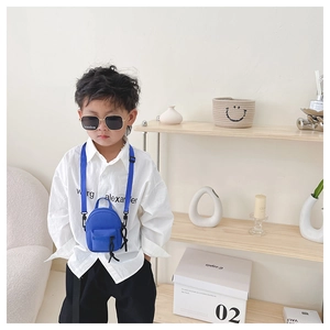 Blue mini canvas crossbody bag for children with adjustable strap and front pocket