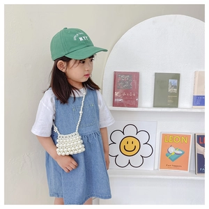 Handmade pearl beaded mini crossbody bag for girls with bow floral design