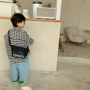 Boys fashion checkerboard shirt and denim jeans set with stylish black crossbody chest bag