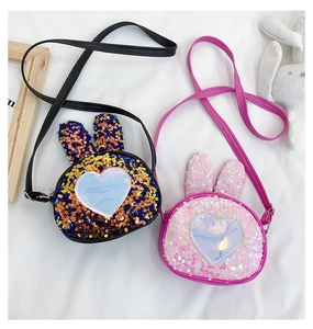 Close-up of glitter sequins and cute bunny ears on kids crossbody shoulder bags
