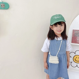 Kids casual white t-shirt and denim suspender skirt with handmade pearl crossbody bag