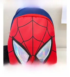 Macro shot of Spider-Man themed kids bag featuring holographic eyes and web patterns