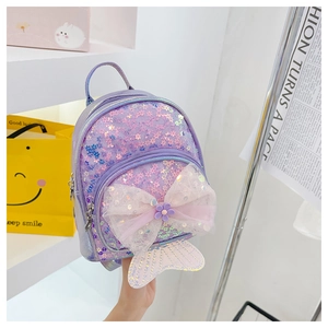 Détail du sac à dos violet à paillettes pour fille avec nœud en maille et sirène
