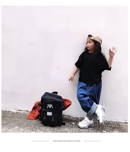 Kids streetwear set featuring a black nylon backpack with stylish letter embroidery