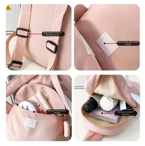 Detail view of pink kids backpack showing adjustable straps and velcro front pocket