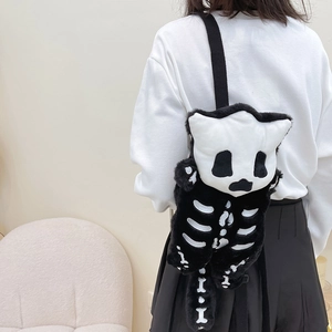 Cute Halloween skeleton cat plush backpack with white bone embroidery and black straps