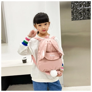Detailed back view of pink toddler rabbit backpack with cute plush tail and 3D ears