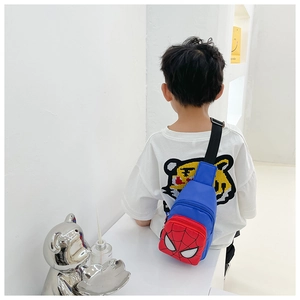 Rear view of kid wearing a blue and red Spider-Man crossbody chest bag with adjustable strap