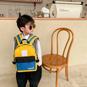 Sac à dos tendance pour enfants au design color-block jaune et bleu marine pour l'école