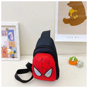 Detail of Spider-Man themed kids chest bag showing spider web pattern and 3D eye patches