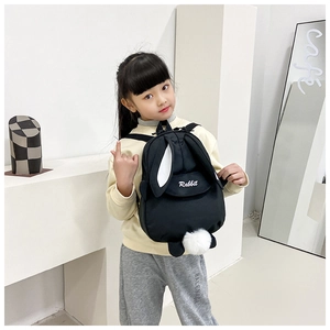 Detail of cute rabbit-style kids backpack featuring 3D long ears and soft plush tail